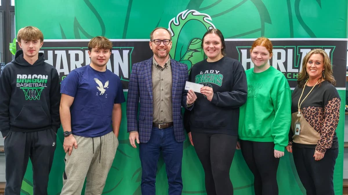 Students and mentors at Harlan school Boom check ceremony